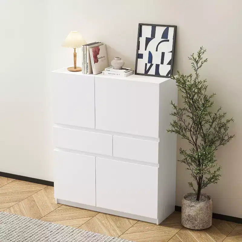 Armario de almacenamiento de madera blanca con 4 puertas y 2 cajones